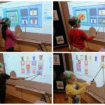 Dzieci rozwiązują zadania na tablicy multimedialnej