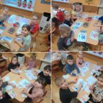 Dzieci przy stolikach wykonują prace plastyczne