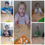 Mrówki wiążą kolorowe wstążki na gałązkach