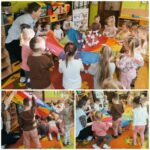 Dzieci-z-pania-podrzucaja-kulki-z-papieru-na-chuscie-Klanza