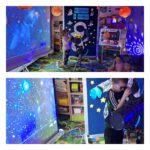 dzieci patrzą przez teleskop