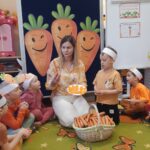 Dzieci poznają cechy marchewki