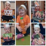 Dzieci z planszami edukacyjnymi