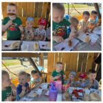 dzieci-jedza-kielbaski-z-ogniska