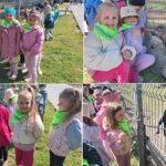 Dzieci oglądają owce i kozy