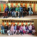 Dzieci siedzą w szatni szkolnej