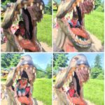 Dzieci wchodzą do paszczy dinozaura