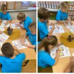 Dzieci malują kolorowanki z okazji Dnia Przedszkolaka