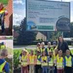 Dzieci z oddziału Biedronek przy koszach na śmieci