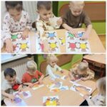 Przedszkolaki z oddziału Żuczki układają w całość pocięte obrazki misiów