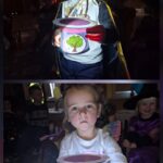 Dzieci podświetlają latarką symbole andrzejkowe