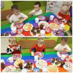 Chłopcy z oddziału Żuczki podczas karnawałowego poczestunku