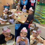 Przedszkolaki jedzą pączusie