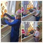 dzieci sadzą kwiatki