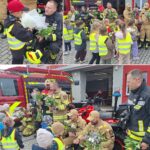 dzieci wręczają kwiaty strażakom