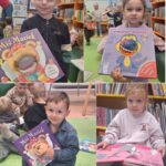 Dzieci z oddziału Biedronek ogladają książki