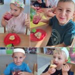 Przedszkolaki smakują soku i jabłka pieczonego